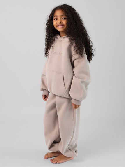 Signature Kids Sweatpants: Malu is 5 wearing a size S