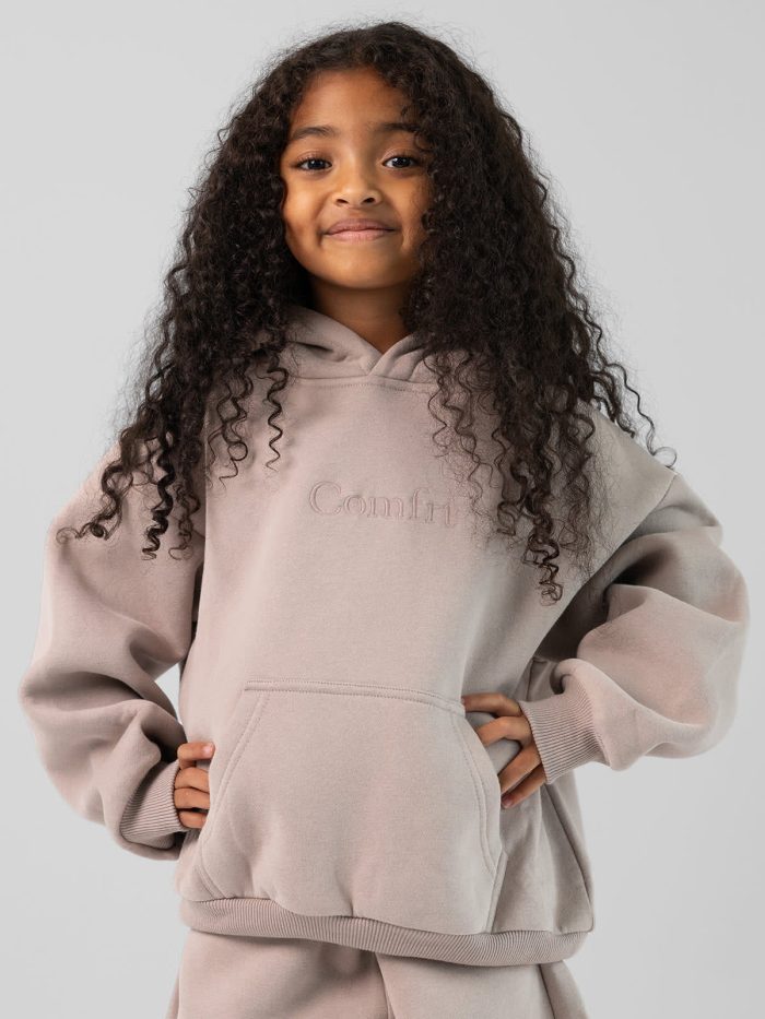 Signature Kids Hoodie: Malu is 5 wearing a size S